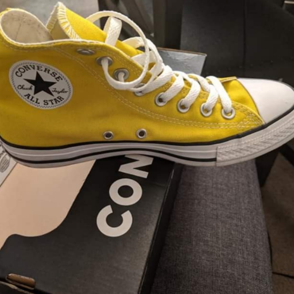 Yellow high top converse